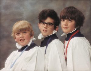 Three brothers in Choir boy uniform