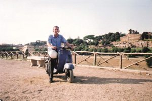 Richard on a moped, ciggie in mouth