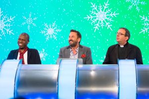 Richard on the set of Would I Lie To You with team mates - Clive Myrie on the left, Lee Mack in the middle and Richard on the right hand side