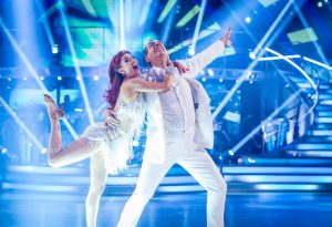 Richard Coles & Dianne Buswell on the ballroom all in white