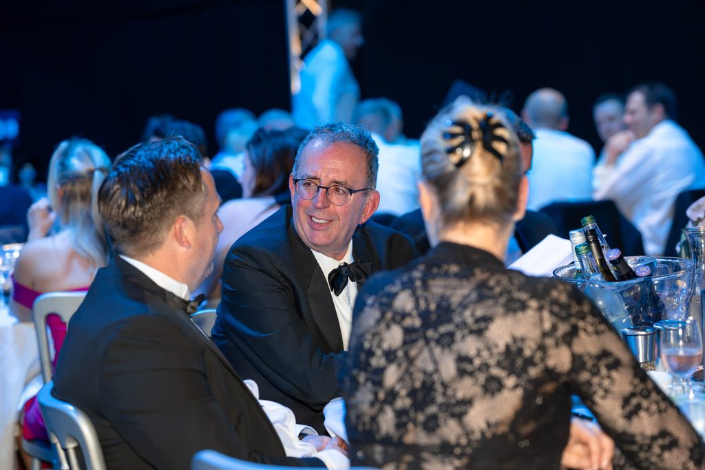 Reverend Richard Coles dining with guests at the SCC Prestige Dinner 2025